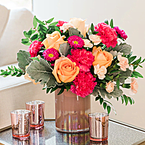 100% LOCAL-FLORIST<br>ARRANGED AND DELIVERED
