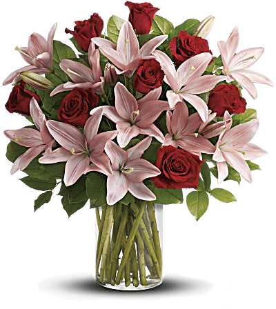 Le bouquet enchanteur comprend des roses rouges, des lys roses et des feuilles de citron fraîches.