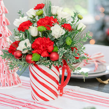 Teleflora's Send a Hug Candy Cane Greeting Bouquet