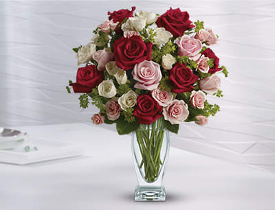 Cupid's Creation with Red Roses by Teleflora
