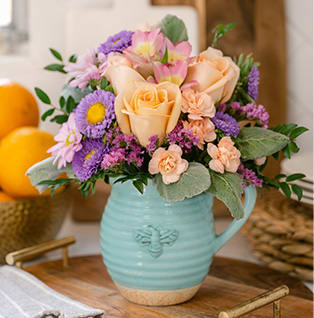 Teleflora's Busy Bee Pitcher Bouquet