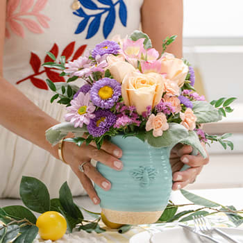 Teleflora's Busy Bee Pitcher Bouquet