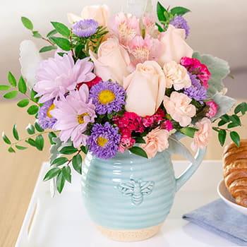 Teleflora's Busy Bee Pitcher Bouquet
