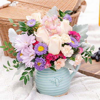 Teleflora's Busy Bee Pitcher Bouquet