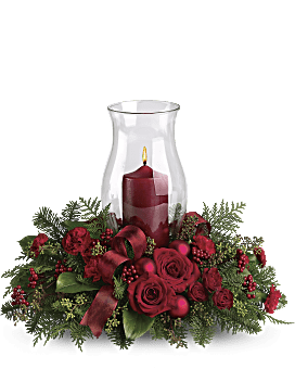 Arreglo floral de centro de mesa con brillo navideño