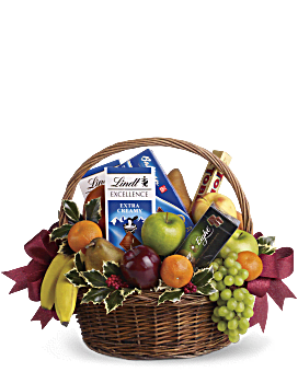 Panier cadeau de sucreries de Noël et de fruits