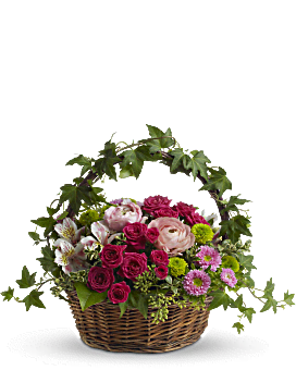 Round Wicker Basket With Hot Pink & Pale Orange Roses, Green Button Mums & More. Teleflora Fairest Of All Mixed Bouquet.