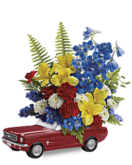 Yellow Alstroemeria, White Button Spray Mums, Blue Delphinium In Red '65 Ford Keepsake. Same Day Flower Delivery. Teleflora '65 Ford Mustang Bouquet.