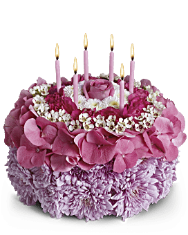 Lavender Cushion Mums, Pink Hydrangea, White Waxflower, Button Mums Sculpted Into A Cake With Same Day Flower Delivery From Teleflora.