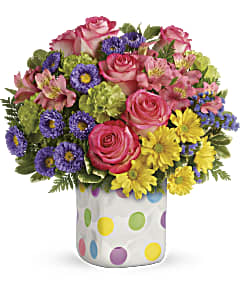 Send a polka dot new baby flower arrangement