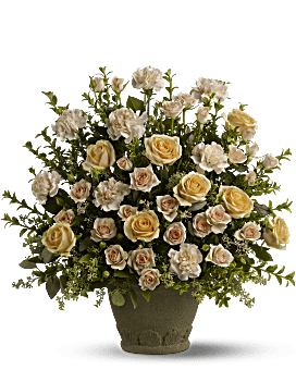 Arreglo floral con recuerdo de rosas de Teleflora