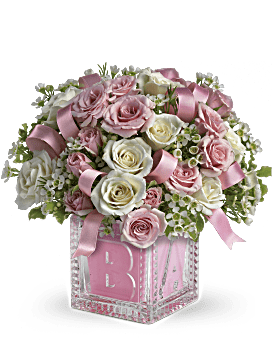 Light Pink Ribbon Weaves Through White & Pink Spray Roses In A Glass Baby Block Vase. Same Day Flower Delivery. Teleflora Baby's First Block.