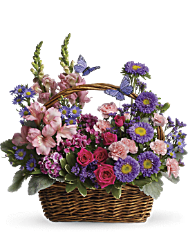 Snapdragons, Alstroemeria, Mini Carnations In A Natural Basket With Decorative Butterflies. Teleflora Country Basket Blooms.