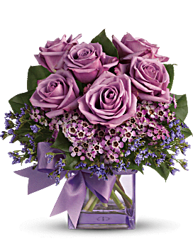 Flower Delivery By Teleflora, Lavender Roses, Waxflower, Purple Limonium & Rich Green Salal In A Purple Glass Vase. Teleflora Morning Melody Mixed
