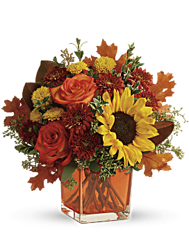 Orange Roses, Yellow Sunflowers, Gold & Rust Cushion Spray Mums, Seeded Eucalyptus & More. Same Day Flower Delivery. Teleflora Hello Autumn Bouquet.